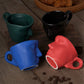 Metal touching face, creative ceramic kiss coffee mug