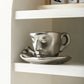 Metal touching face, creative ceramic kiss coffee mug