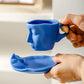 Metal touching face, creative ceramic kiss coffee mug