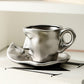 Metal touching face, creative ceramic kiss coffee mug